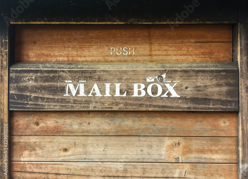 vintage old brown wood mailbox background.