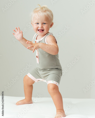 Smiling toddler posing