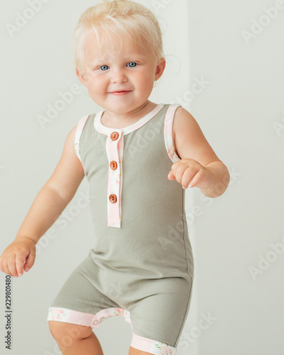 Smiling toddler standing