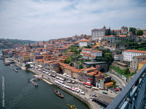 Old buildings near the river bay in the town of Porto, Portugal, historic city center near the bridge