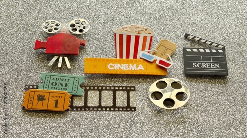 Принти на полотні tub of popcorn with cinema sign and 3d glasses movie tickets on film strip proje