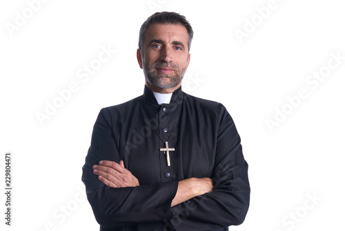 Crossed arms priest portrait senior