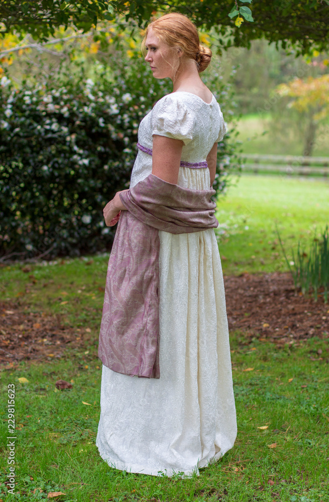 Regency woman in cream embroidered gown
