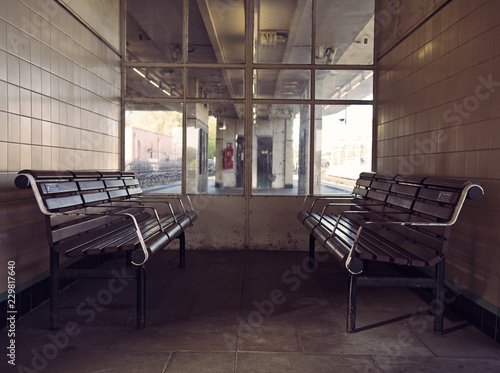 Retro wooden benches at a train station
