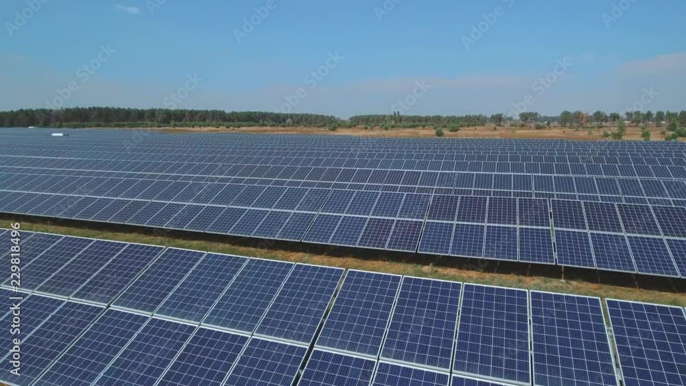 Solar battery farm on meadow. Shot on drone Solar battery farm on meadow. Shot on drone