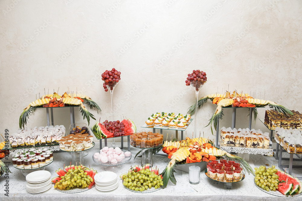 Fototapeta premium Candy bar. Table with sweets, candies, dessert.