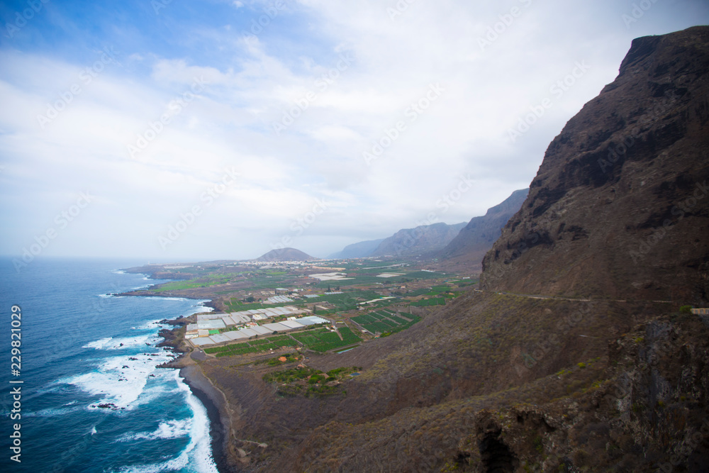 nice veiw to the valley and Atlantic ocean with waves and mountains Tenerife, Spain
