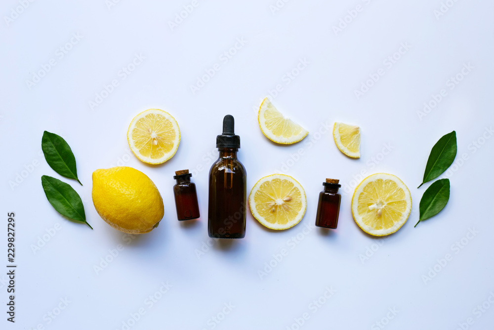 Fresh lemon with lemon essential oil. Fresh lemon with lemon essential oil.