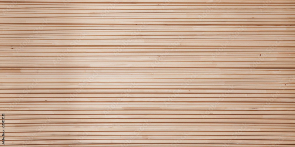 Folded wooden lining in a sawmill. Piled alder boards as texture Folded wooden lining in a sawmill. Piled alder boards as texture