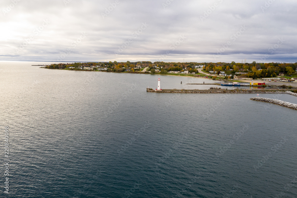Aerial view of wawatam lighthouse at the harbor of St. Ignace, Michigan in the Straits of Mackinac