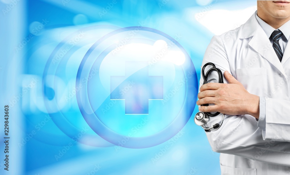 Young doctor man holding stethoscope Young doctor man holding stethoscope