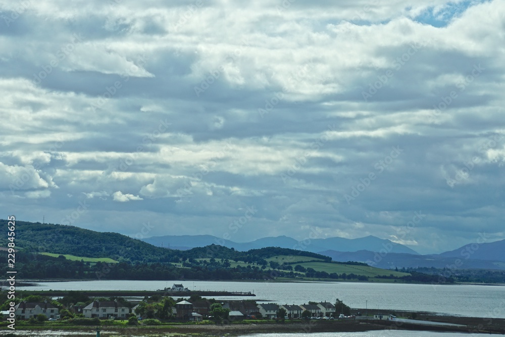 Thick white clouds over the Beauly Firth, an inlet of the Moray Firth, between the village of North Kessock and the city of Inverness in the Scottish Highlands.