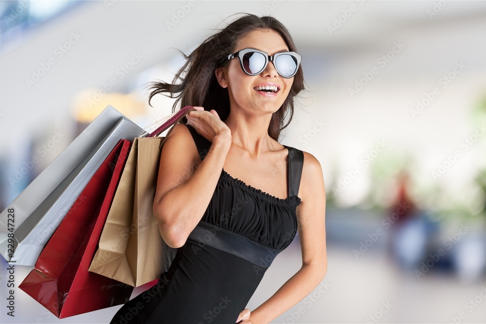 Young woman with shopping bags
