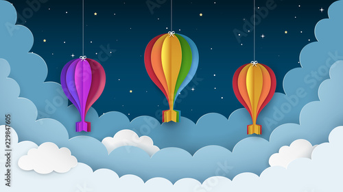 Colorful hot air balloons, stars and clouds on the dark night sky background. Night scene background. Hanging paper crafts with ribbons and bows. Paper cut style. Vector Illustration.