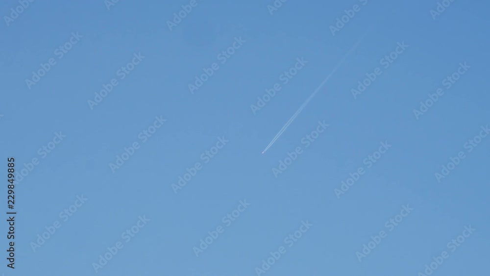 4K Distant Shot of Airplane and Vapour Trail. 4K Distant Shot of Airplane and Vapour Trail.