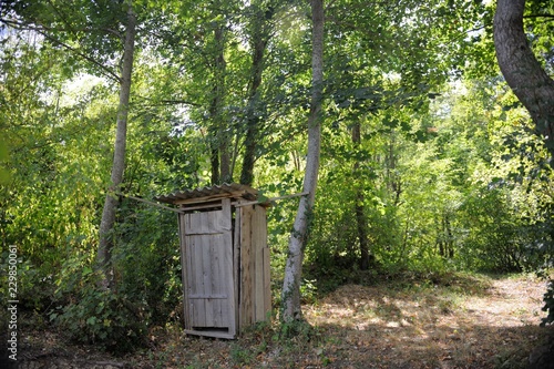 wooden retro outdoor toilet photo