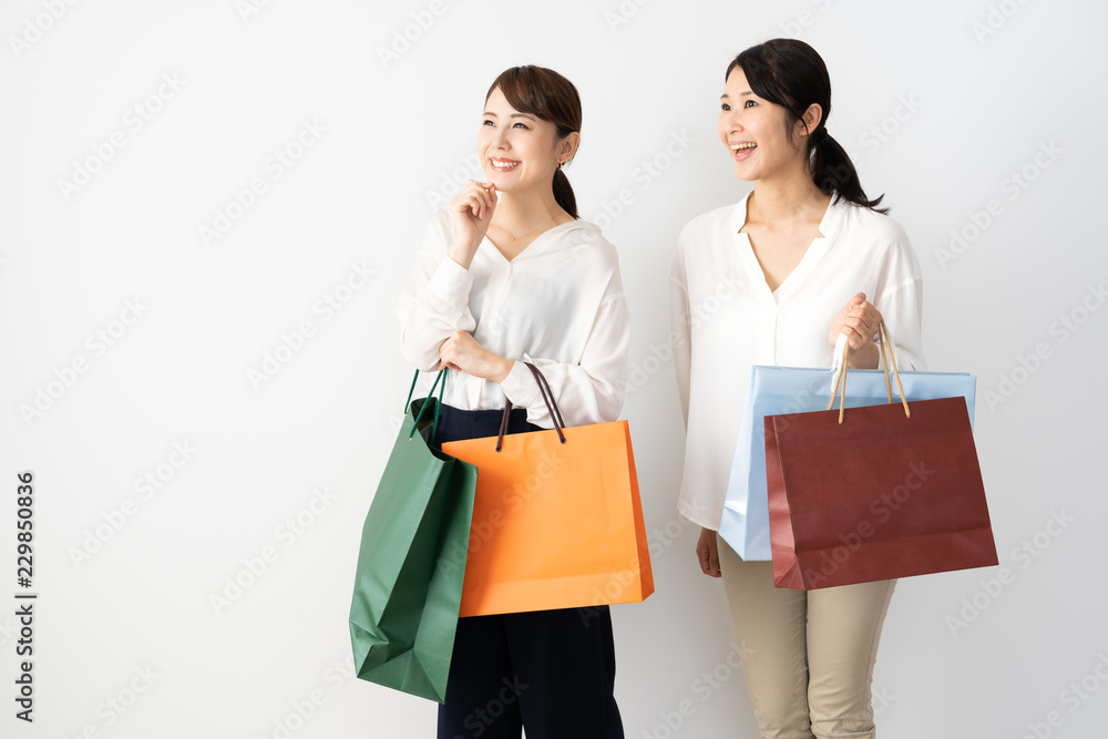 young asian women shopping on white background young asian women shopping on white background
