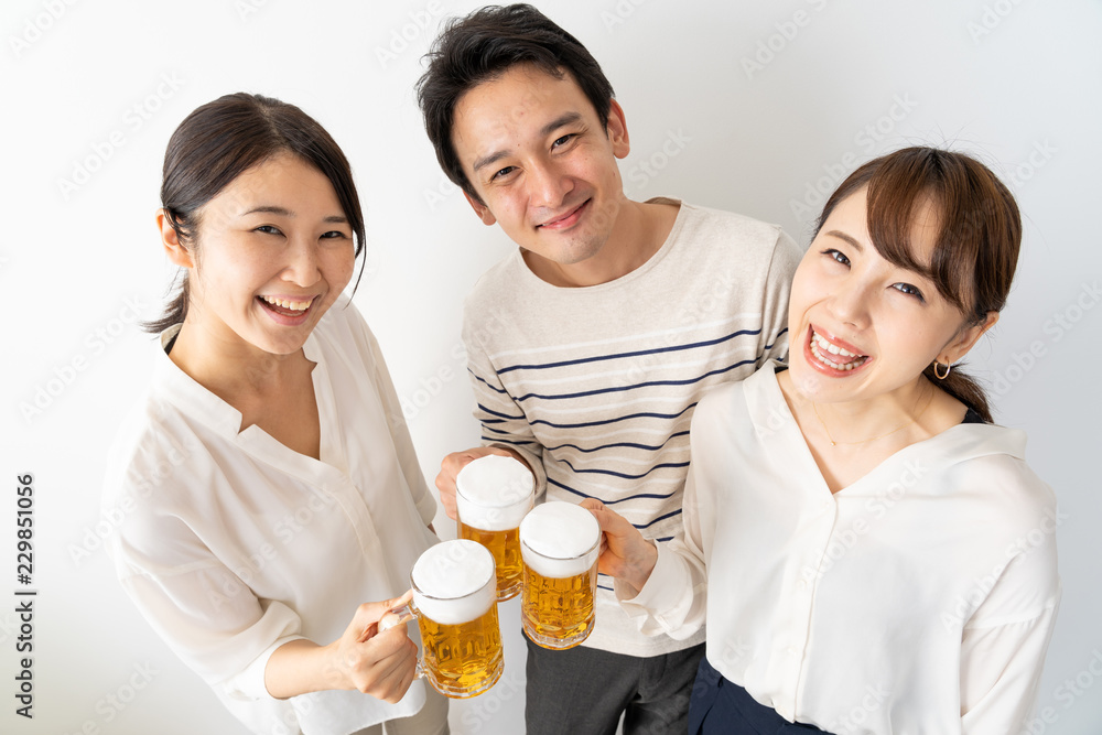 young asian group drinking beer