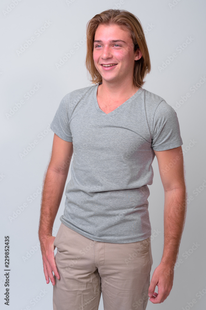Young handsome man with long blond hair Young handsome man with long blond hair
