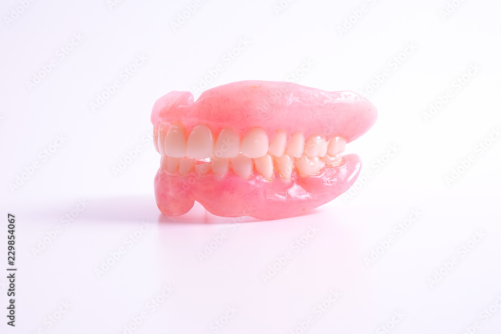 Obraz premium A set of dentures isolated on a white background.