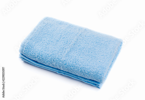 Blue or cyan towel isolated on white background.