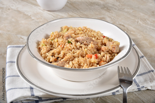 Bowl of fried rice with chicken