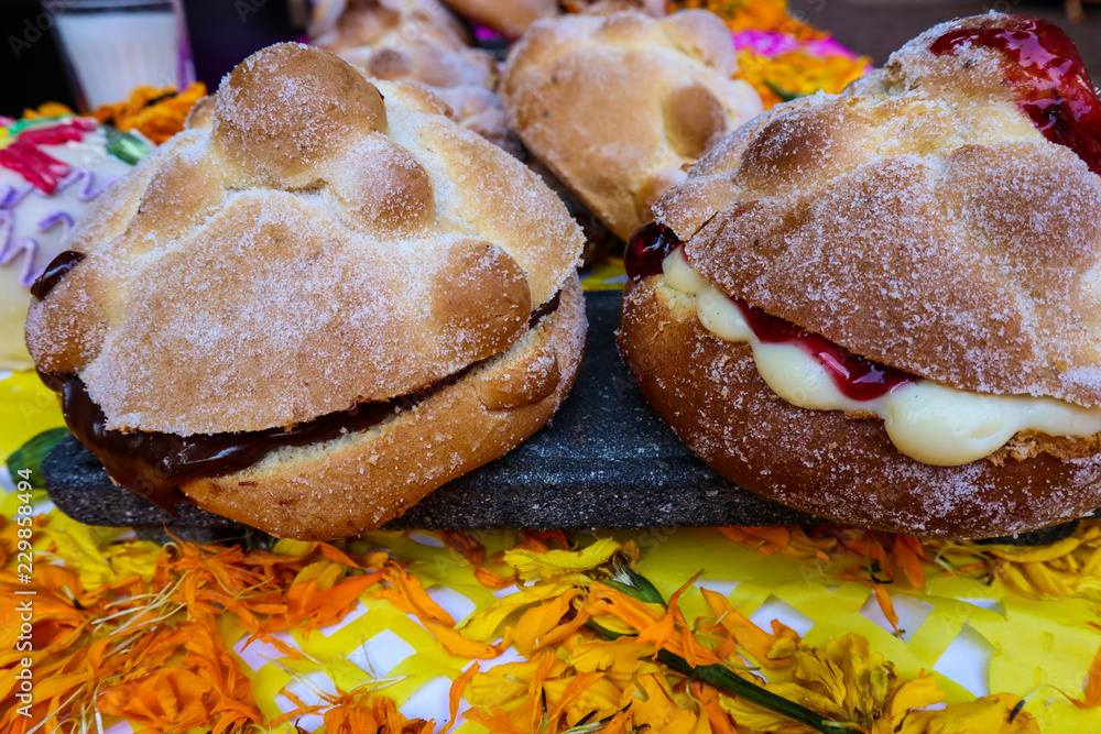 Premium Photo  Three pieces of pan de muerto. day of the dead