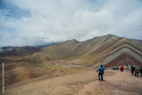 Vinicunca, also called Montaña de Siete Colores, Montaña de Colores or Rainbow Mountain, in a cloudy day, in Perù.