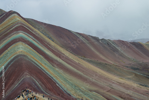 Vinicunca, also called Montaña de Siete Colores, Montaña de Colores or Rainbow Mountain, in a cloudy day, in Perù.