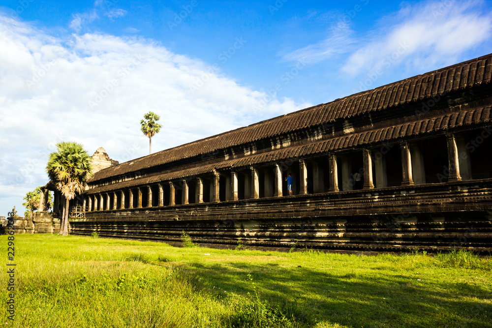 Ancient Angkor Wat temple with blue sky