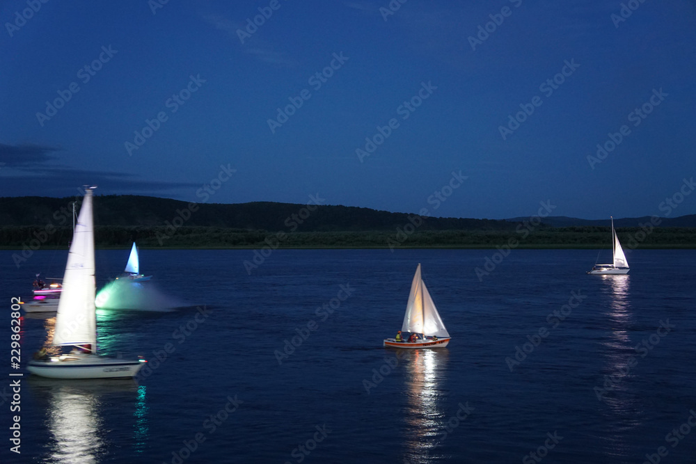 sailing boat in rifer at sunset sailing boat in rifer at sunset