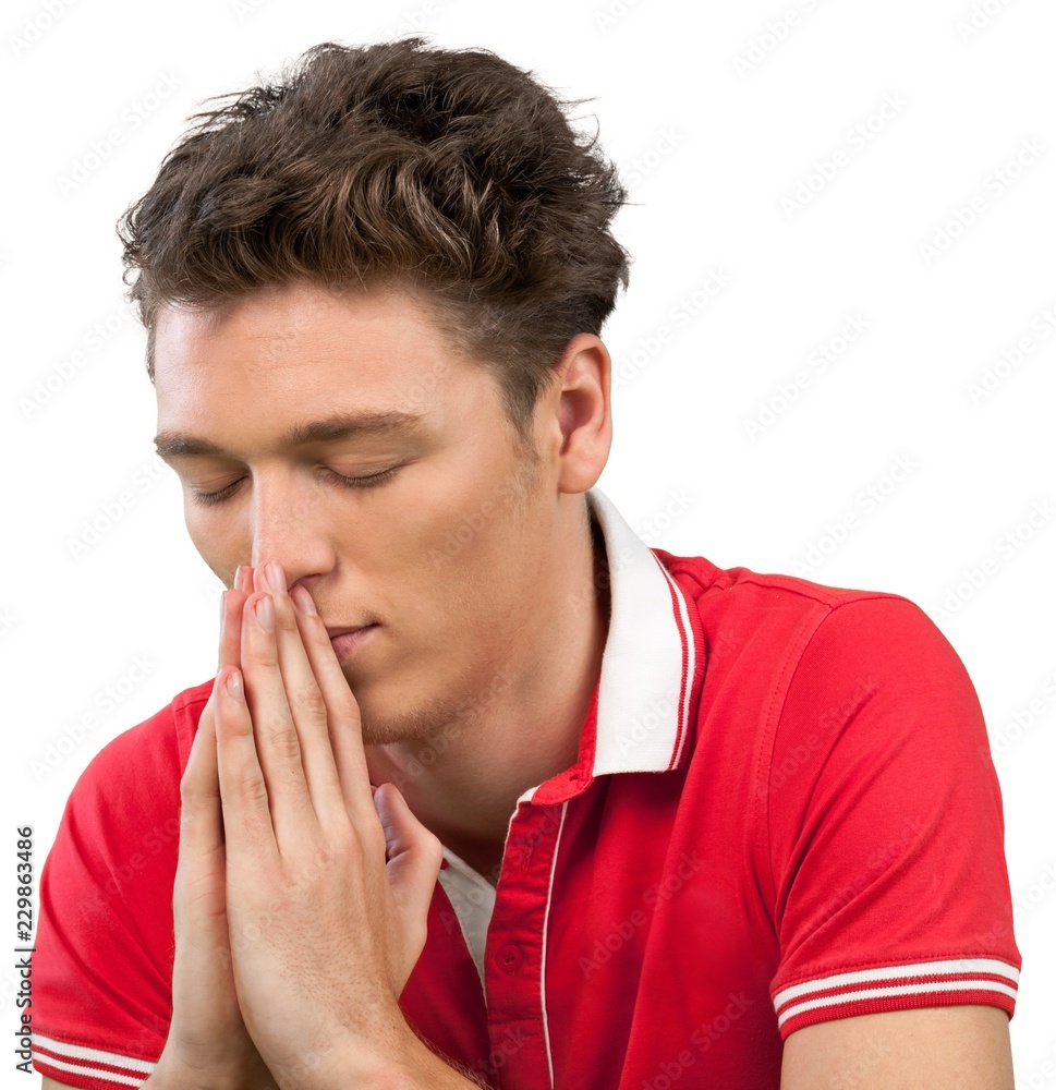 Young man praying