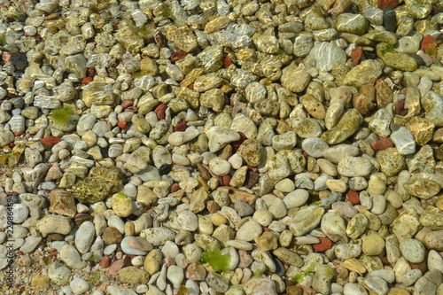 colored stones at the bottom of the sea 