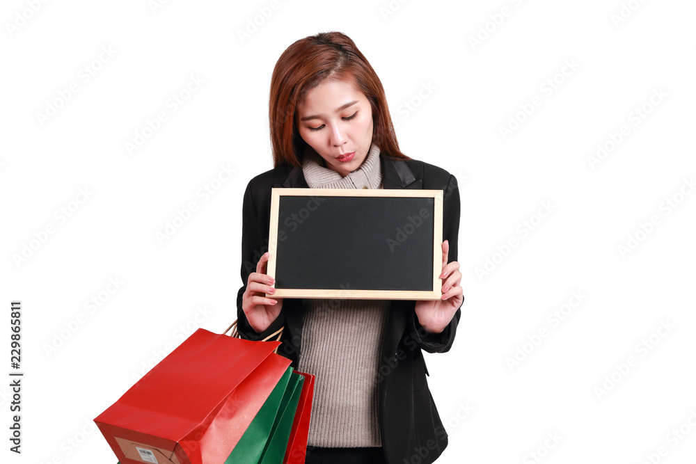 shopping woman holding shopping bags and blank blackboard isolated on white background for you own message shopping woman holding shopping bags and blank blackboard isolated on white background for you own message