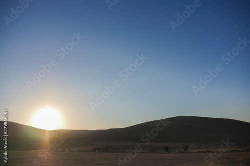 Sunset above mountain in the desert. Israel © Avishay