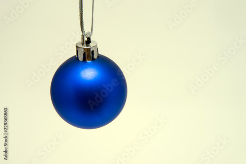 Christmas ball in blue on a white background