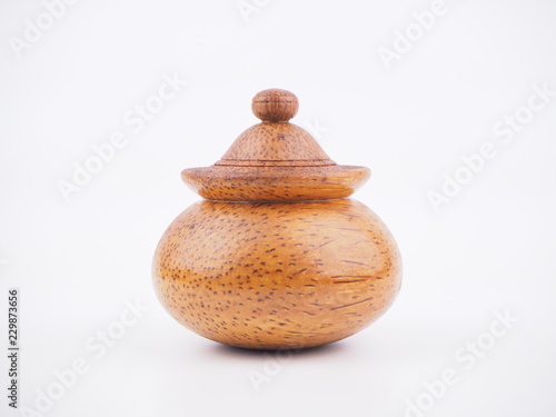 Water jar made of wood. Is on a white background.