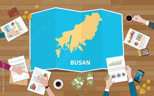 busan pusan south korea city region economy growth with team discuss on fold maps view from top