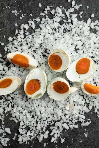 Fototapeta Naklejka Na Ścianę i Meble -  salted egg asian ingredient salty eat with boiled rice flat lay top view