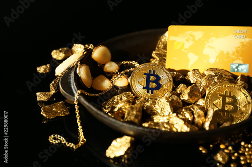 Tray with gold nuggets, bit...