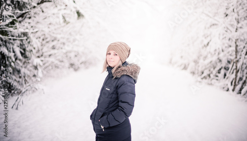 young woman on snowy path