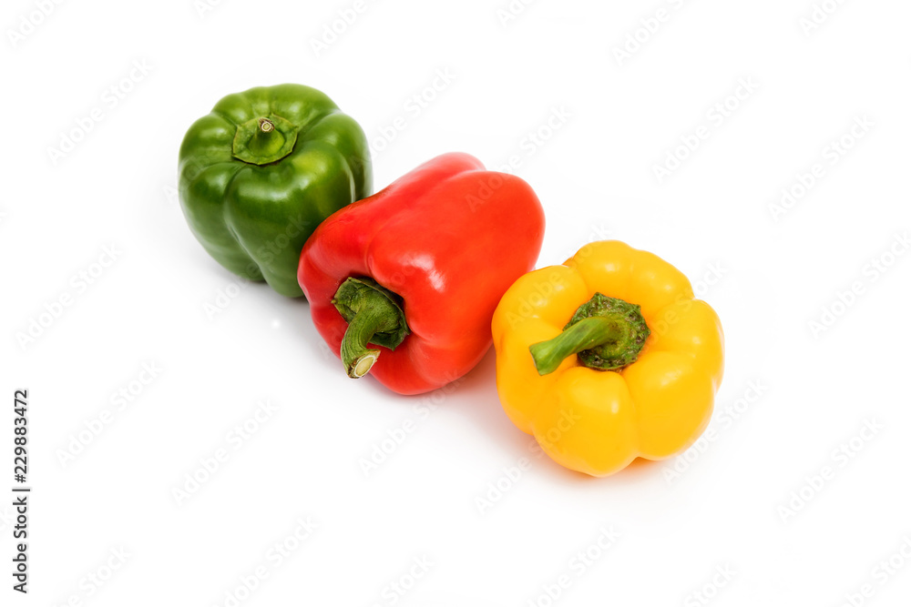 green, red, yellow sweet bell peppers isolated on white background green, red, yellow sweet bell peppers isolated on white background