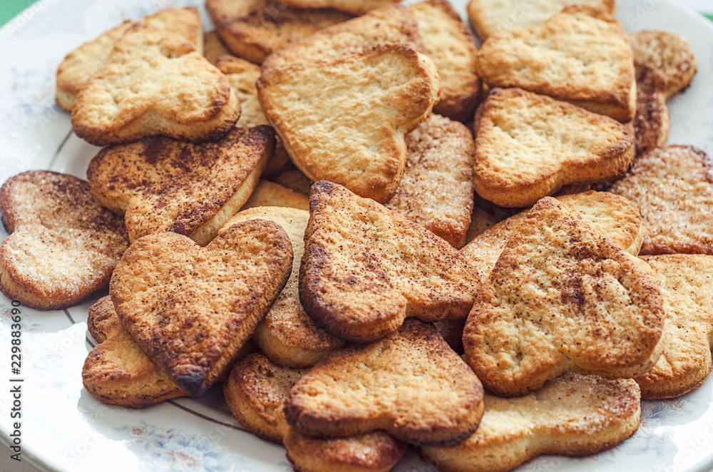 delicious homemade cinnamon cookies in the shape of hearts delicious homemade cinnamon cookies in the shape of hearts