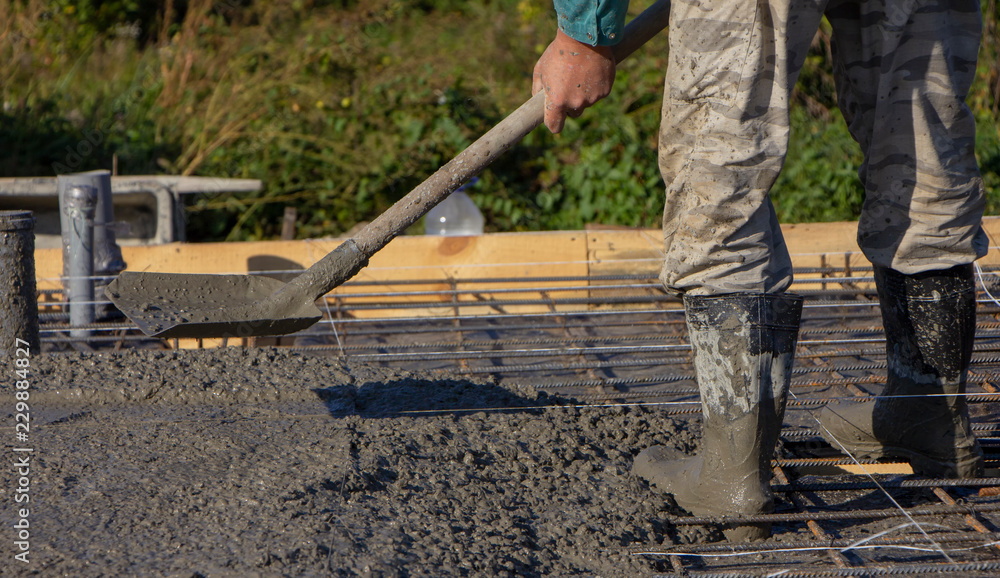Concreting builders poured fresh, high-quality concrete close up Concreting builders poured fresh, high-quality concrete close up
