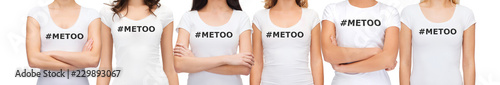 social issue concept - group of women in white t-shirts with metoo hashtag in solidarity with movement against sexual assault and harassment photo