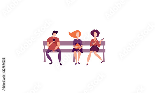 People are sitting on a bench
