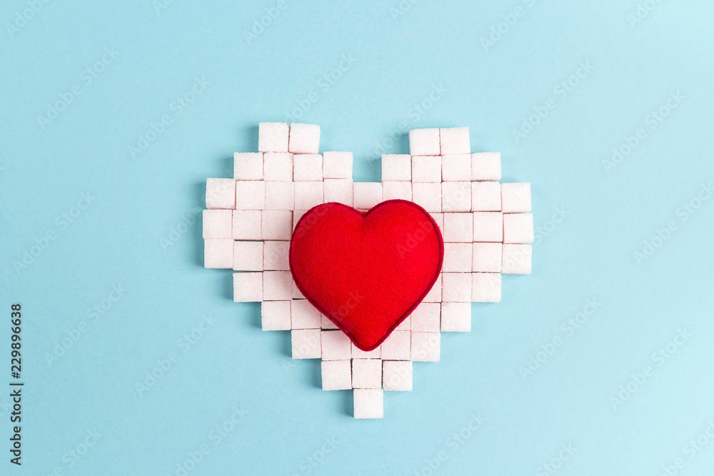 Heart from sugar cubes with red decorative heart. Heart from sugar cubes with red decorative heart.