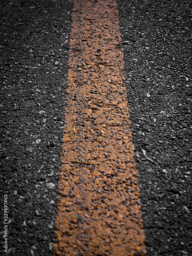 Obraz premium Asphalt road with separation yellow lines