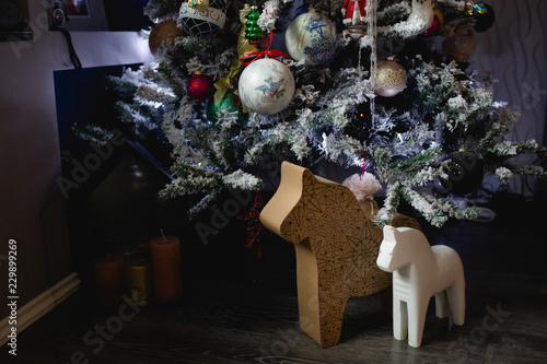 Blue lights Christmas tree with DYI balls and toy horses