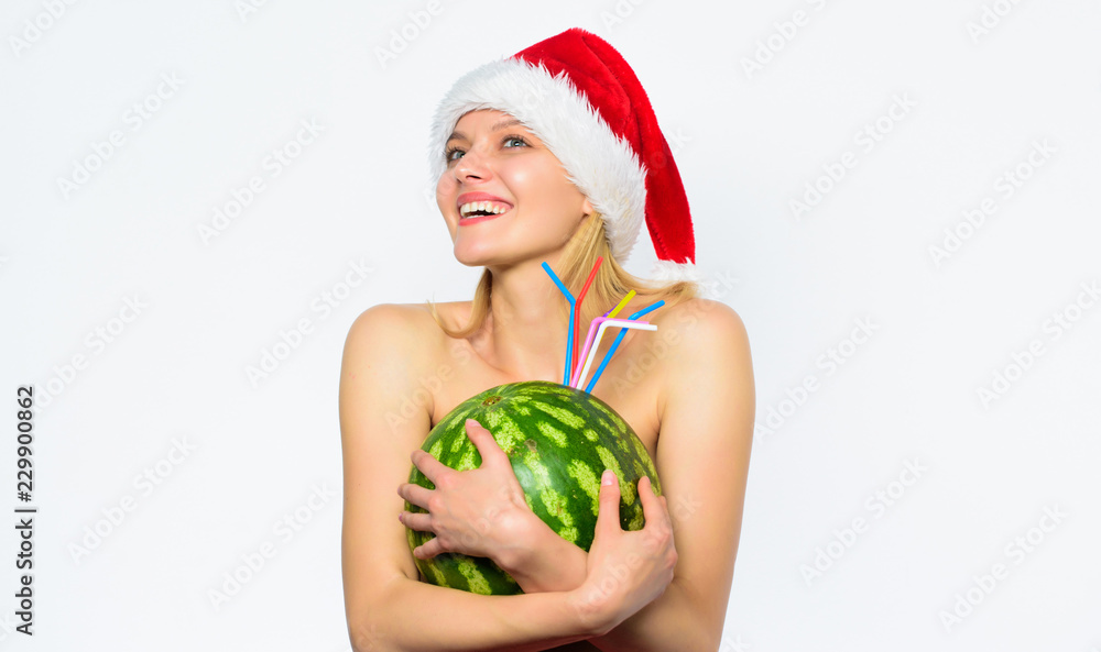 Winter detox concept. How to detox after christmas. How to give your body basic detox. Watermelon dietary detox beverage. Girl attractive naked wear santa hat hug watermelon white background Winter detox concept. How to detox after christmas. How to give your body basic detox. Watermelon dietary detox beverage. Girl attractive naked wear santa hat hug watermelon white background